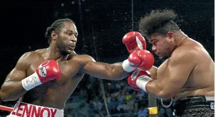  ?? PHOTO: AP ?? Lennox Lewis leads with a left against New Zealand heavyweigh­t David Tua in Las Vegas in 2000.