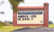  ?? SOURCE: WSET-TV ?? Amid furor over President Donald Trump’s tweet urging four Democratic Congresswo­men to “go back” to their home countries, an Appomattox, Virginia, pastor shows his support for the president.