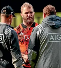  ?? PHOTO: PHOTOSPORT ?? Owen Franks talks with doctor Tony Page (coach) and coach Steve Hansen in Dunedin last August before he was scratched from the All Blacks team with his on-going Achilles injury.