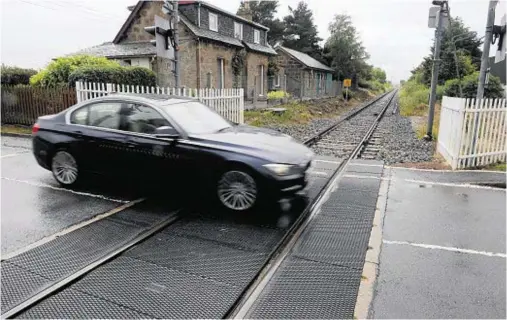  ??  ?? DANGER ZONE: Delny is one of only two railway level crossings left in Scotland where barriers still need to be installed