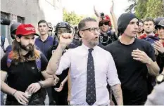  ?? AP ?? Gründer Gavin McInnes (M.) bei einer Demo der Proud Boys.