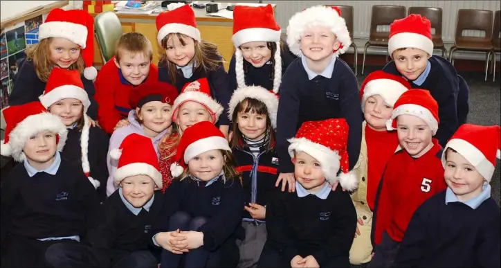  ??  ?? Happy Santas......Pupils from junior and senior infants who took part in Bellurgan National School’s annual concert held in the school.