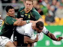  ?? ANDREW GORRIE/STUFF ?? Fiji’s Seremaia Bai with the ball playing against South Africa at the 2011 Rugby World Cup.