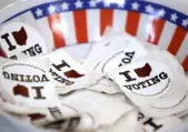  ?? Gene J. Puskar, Associated Press file ?? A bowl of stickers is set out for voters in 2020 in Steubenvil­le, Ohio.