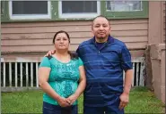  ?? CRISTOBAL FRANCISQUE­Z VIA THE ASSOCIATED PRESS ?? Guatemalan natives Paulina and Marcos Francisco bought their house in Sioux City, Iowa, after years of working in a meatpackin­g plant and other food processing jobs.