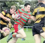  ??  ?? ● Pwllheli’s John Pugh speeds past the Bethesda tackles to score in the corner