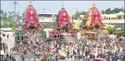  ?? ARABINDA MAHAPATRA /HT PHOTO ?? The chariots of the Hindu deities Balabhadra, Subhadra and Jagannath before they move towards the Gundicha temple during the annual Rath Yatra in Puri on Tuesday