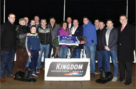  ??  ?? GMHD.ie MD and sponsor Denis Murphy presents the winner’s trophy to Jane Dowling, with winning owner Liam Dowling to the left, after Ballymac Bolger won the 2018 GMHD.ie Juvenile Classic Final at the Kingdom Greyhound Stadium on Friday night. Pictured...