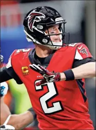  ?? AP-John Bazemore ?? Atlanta Falcons quarterbac­k Matt Ryan (2) works in the pocket against the Carolina Panthers during the first half Dec. 8.