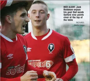  ?? PICTURES: Media Image ?? RED ALERT: Jack Redshaw enjoys his goal that sends Salford nine points clear at the top of the table