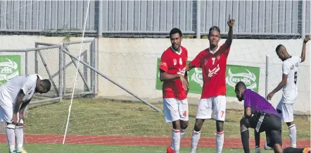  ?? Photo: Waisea Nasokia ?? Rewa’s Sairusi Nalaubu celebrates with Rewa players after scoring his second goal against Suva in the 2018 INKK Mobile Battle of the Giants at the Churchill Park in Lautoka on July 20, 2018.