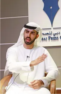  ?? Photo by Shihab ?? World’s first AI minister Omar bin Sultan Al Olama interacts with media at Dubai Press Club on Wednesday. —