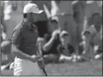  ?? The Associated Press ?? TAKING THE LEAD: Abraham Ancer, of Mexico, reacts after his putt on the 16th green during the third round of the Quicken Loans National golf tournament Saturday in Potomac, Md. Ancer birdied two of his last three holes on the day for his lowest career score, an 8-under 62.