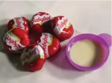  ?? RICHARD LAUTENS/TORONTO STAR ?? To “cook” your “mini fondue” Babybel unwrap the cheese, place in it the small plastic dish provided, then pop it in the microwave for 30 seconds.