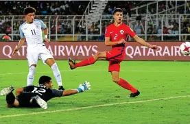  ??  ?? Sancho pounces: England’s striker scores the third goal