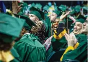  ?? WRIGHT STATE UNIVERSITY ERIN PENCE / ?? Wright State University graduates celebrate at the Nutter Center in Fairborn in December 2023.