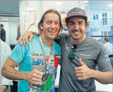  ??  ?? EN LA F1. Salgado estuvo con Alonso, nuevo socio de honor del Madrid,en el Gran Premio de Monza.