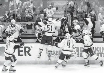  ?? Robert Gauthier Los Angeles Times ?? THE CELEBRATIO­N kicked into overdrive after Austin Watson’s empty-net goal made it 3-1 in final minute.