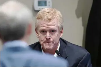  ?? Joshua Boucher/The State via AP, Pool ?? Alex Murdaugh is cross-examined by prosecutor Creighton Waters on Thursday after taking the stand during his murder trial at the Colleton County Courthouse in Walterboro, S.C.