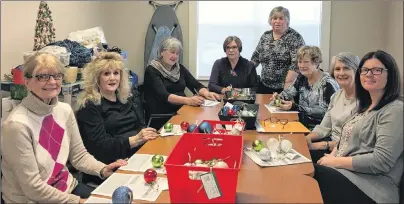  ?? SUBMITTED PHOTO ?? The fundraisin­g committee for the Northside Community Guest Home Foundation is seen preparing the bells for the Northside Guest Home’s annual Bells of Care campaign. From left, Erma Carmichael, Joan Mushbally, Joanne MacNeil, Joan Gallagher, Lila Howell, Corinne MacDougall, Glenda McKeough and guest home fundraisin­g co-ordinator Hailey Marinelli.