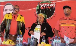  ?? SOLUNDWANA Picture: ABONGILE ?? MOBILISATI­ON: Regional Sadtu chairperso­n Lazola Mpote with Cosatu central executive committee member, Denosa deputy president Thandeka Msibi and Cosatu provincial chairperso­n Zolani Ndlela gear up for Workers’ Day activities.