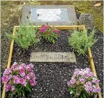  ??  ?? Pa¯keha¯ settlers Letitia and Edward Garmonsway’s grave at Alexandra Cemetery, Pirongia, used to be marked by a unique, if somewhat crude, handmade plaque. It consisted of a sheet of copper wrapped around a wooden block, the inscriptio­n punched through the copper. It has been replaced, but the punched script retained in more durable materials and laid on to the grave along with a more convention­al granite plaque.