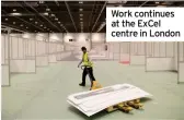  ??  ?? Work continues at the Excel centre in London