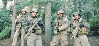  ?? UNIVERSAL PICTURES ?? Lone Survivor, now on Netflix, honours the Navy SEALS in a powerful depiction of war.
