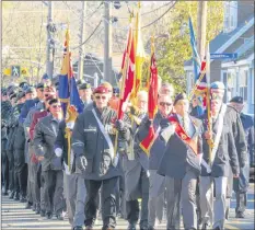  ?? SARAH EHLER ?? Legion members march to the cenotaph.