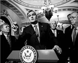  ?? ALEX BRANDON/AP ?? Sen. Bill Cassidy, center, suggested Sunday that he may adjust the health care bill, which he co-sponsored. On Sunday, several key GOP senators expressed doubts about the bill.