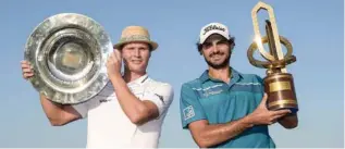  ?? – Supplied photo ?? THE WINNERS: NBO Golf Classic Grand Final winner Clement Sordet, right, and champion Tapio Pulkkanen pose with their trophies. ‘Road to Oman’