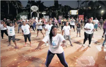  ??  ?? MOVE IT: Free fitness classes in the square at uShaka Marine World are drawing the crowds. PICTURE: MOTSHWARI MOFOKENG