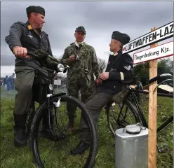  ??  ?? Ronan Buggle , Mick Kingston and Tony O’Callaghan from Ardfert pictured at the Listowel Military Tattoo - now back this May bank holiday as the Listowel History Festival.