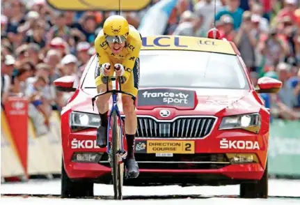  ?? – Reuters ?? HOME STRETCH: Team Sky rider Geraint Thomas of Britain, wearing the overall leader’s yellow jersey, finishes Stage 20 Individual Time Trial from Saint-Pee-sur-Nivelle to Espelette.