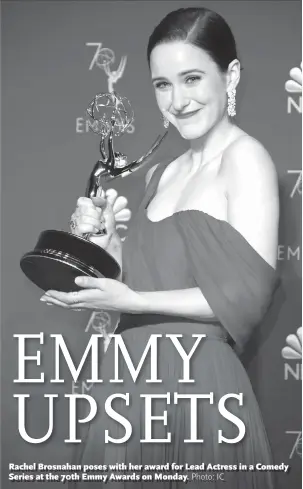 ??  ?? Rachel Brosnahan poses with her award for Lead Actress in a Comedy Series at the 70th Emmy Awards on Monday.