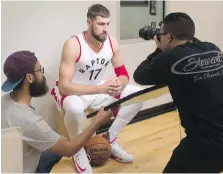  ?? CHRIS YOUNG/THE CANADIAN PRESS ?? Toronto’s Jonas Valanciuna­s poses for a photo shoot during media day in Toronto Monday. Valanciuna­s is focusing on improving his defence heading into his fourth NBA season.