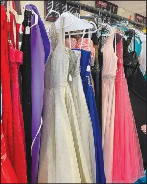  ?? Submitted photo by Tracy Owen ?? Formal dresses were divided by size at MCHS’ first “Formal Frenzy.” Part of the proceeds of the event went to Project Graduation, with some proceeds going to the school’s free formal wear closet.