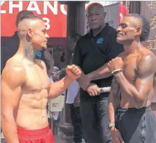  ?? Picture: MELI LADDPETER ?? Former super welterweig­ht champion Jese Ravudi during a face-off with New Zealand opponent Dylan Archer in Suva yesterday.