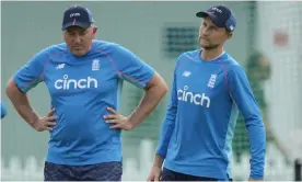  ?? Photograph: Alastair Grant/AP ?? Chris Silverwood and Joe Root look set to have different paths in front of them following the Ashes defeat.