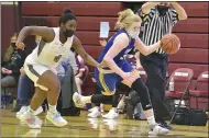  ?? PETE BANNAN — MEDIANEWS GROUP ?? Downingtow­n East’s Caroline Brennan (14) grabs a loose ball as Henderson’s Whitney Evans (4) chases on Thursday.