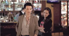 ?? PHOTOS BY IFC FILMS ?? Juliette Binoche, left, is an A-list actress wrestling with a new project and Kristen Stewart is her assistant in “Clouds of Sils Maria.”