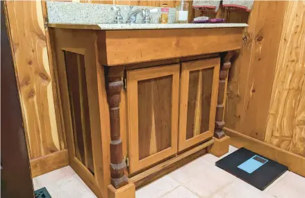  ?? TIM CARTER ?? This is a custom-made vanity. The homeowner is a woodworker and used timber from his land to build it.
