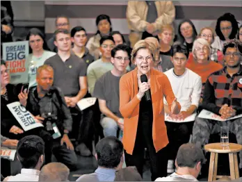  ?? SCOTT OLSON/GETTY ?? Sen. Elizabeth Warren chastised Sen. Bernie Sanders over the weekend after a report that his campaign instructed volunteers to speak poorly of her to win undecided voters.