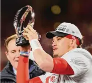  ?? Reed Hoffmann / Associated Press ?? Kansas City Chiefs quarterbac­k Patrick Mahomes lifts the Lamar Hunt Trophy after they defeated the Bengals in the AFC Championsh­ip game on Sunday.