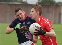  ??  ?? Declan Murphy of Horeswood closes in on Fethard’s Seán Donohoe.