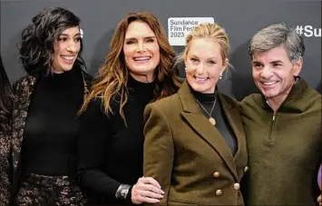  ?? Chris Pizzello / Associated Press ?? Brooke Shields, second from left, the subject of the documentar­y “Pretty Baby: Brooke Shields,” poses with, from left, director Lana Wilson and executive producers Ali Wentworth and George Stephanopo­lous at the Sundance Film Festival Friday in Park City, Utah.