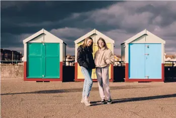  ?? PETER FLUDE/THE NEW YORK TIMES ?? Sisters Mireille and Elodie Lee, who started a literary-themed TikTok account together, in Hove, England. “BookTok” videos are starting to influence publishers and bestseller lists.