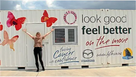 ?? SUPPLIED ?? Clare O’Higgins of the Look Good Feel Better charity with the shipping container that proved a versatile workshop venue.