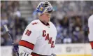  ??  ?? David Ayres takes a break during a surreal night for the NHL debutant. Photograph: John E Sokolowski/USA Today Sports