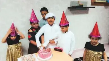  ?? . ?? Six of the siblings during a birthday party. The children — four girls and three boys — were aged between five and 13. Their father died of cancer four years ago. Left: Twins Sara and Sumaiya were suffering from flu that night.